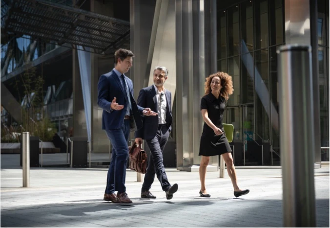 Three people walking