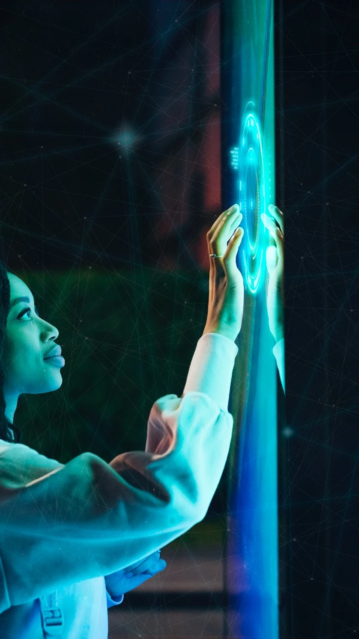 A woman using an intractive screen